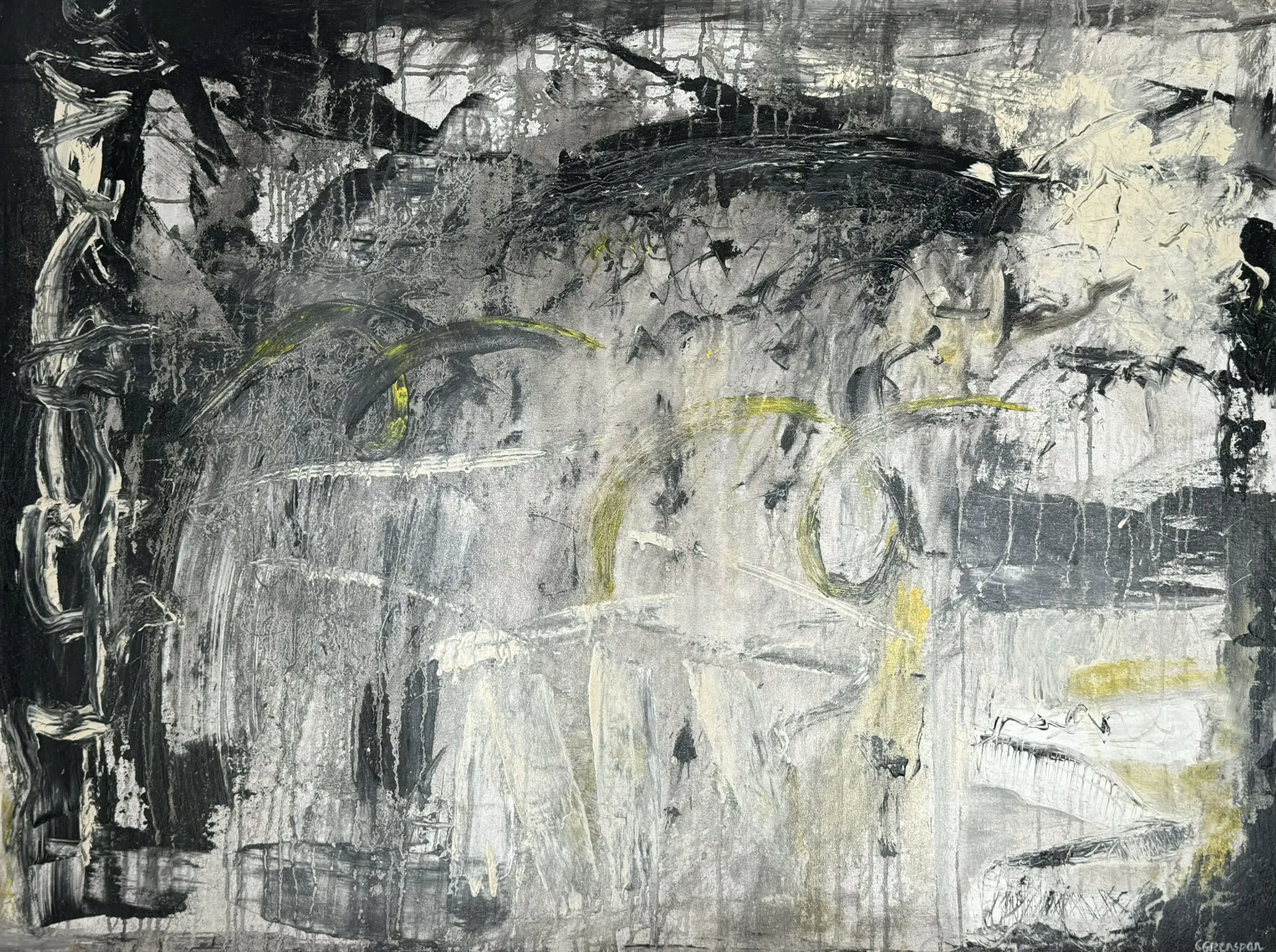 A heavily worked, textured surface in charcoal, smoke-grey and cream, scraped and built up in layers, with threads of pale yellow drifting through a hushed near-monochrome field.